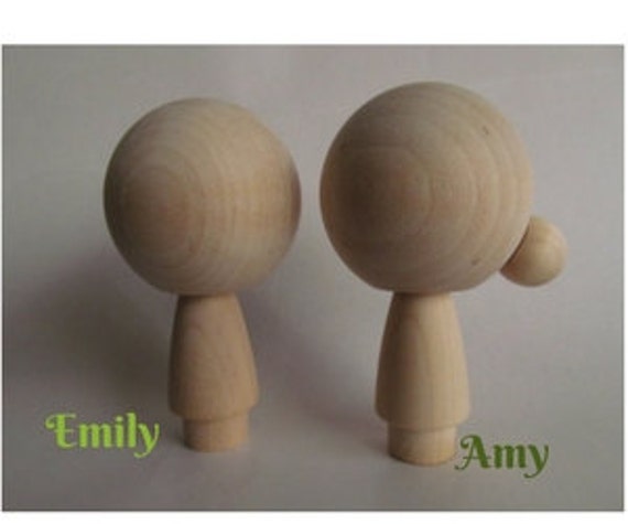 unfinished kokeshi dolls