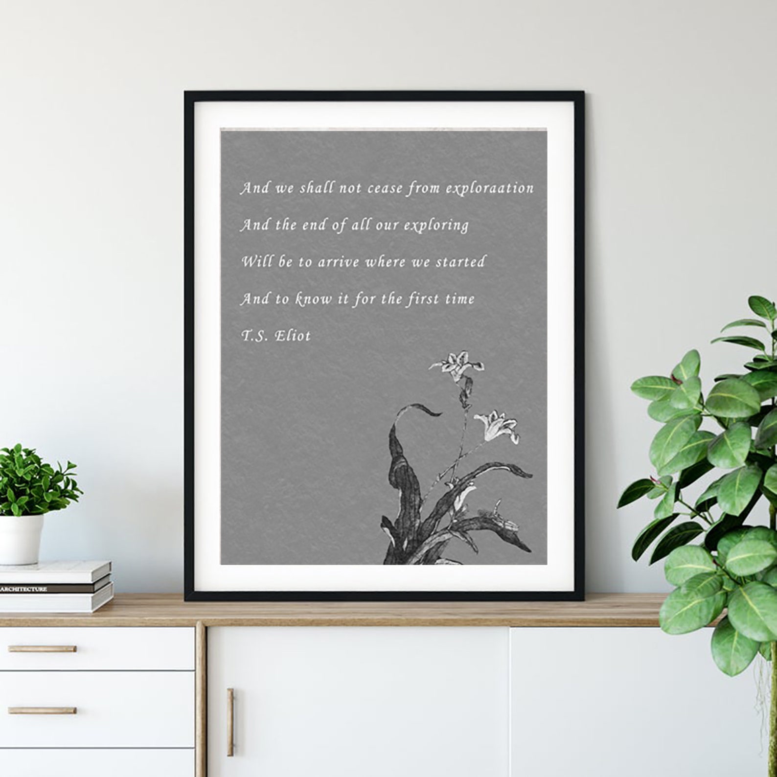 Framed print featuring T.S. Eliot’s quote from The Waste Land about exploration and journey