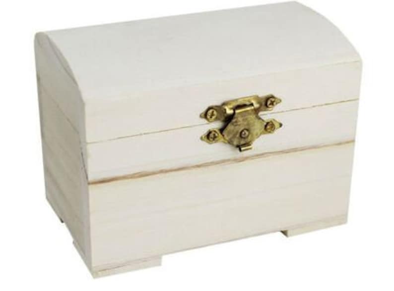 May include: A white wooden chest with a hinged lid and a brass latch. The chest has a slightly rounded top and a rectangular base.