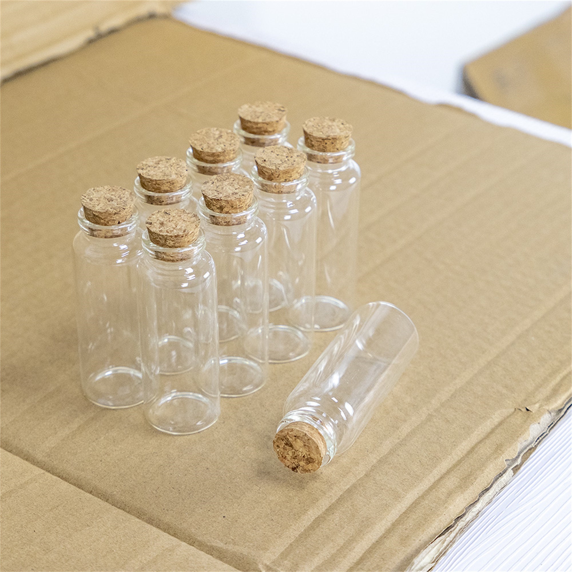 EOI Small clear glass bottle with cork - Bound to be Different