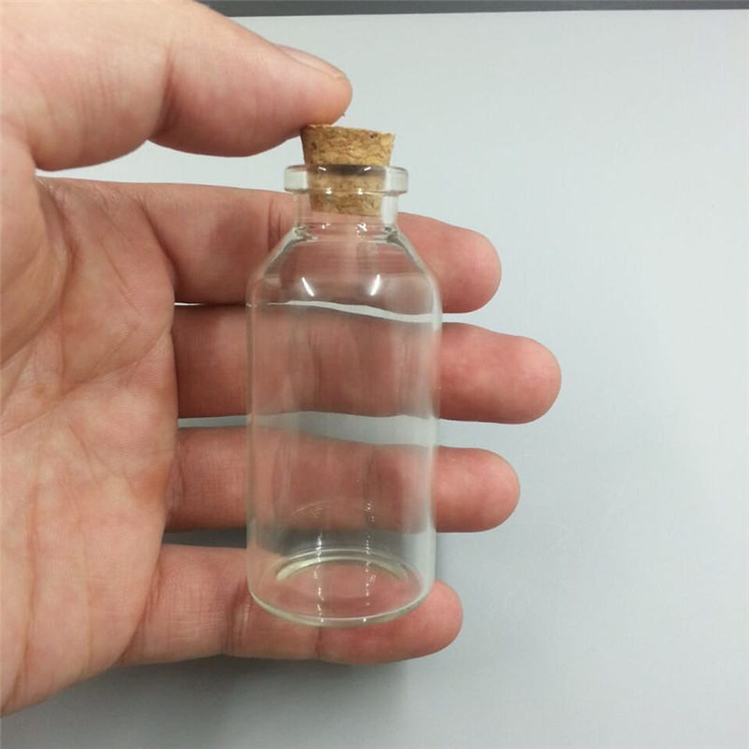  30 mini botellas de vidrio transparentes de 0.9 x 0.6
