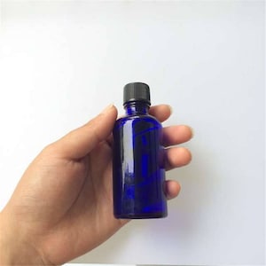 12pcs 10ml 15ml 20ml 30ml 50ml 100ml Glass Bottles with Black Cap Blue Sealing up Bottles Jars Containers