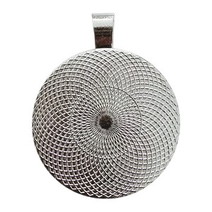 May include: A silver-colored pendant with a round, textured face and a small loop at the top. The face features a spiral pattern of intersecting lines, creating a detailed, geometric design. The pendant is likely for jewelry making or crafting.