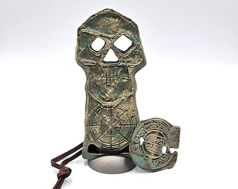The Goonies skeleton key replica + doubloon + stand.  film prop