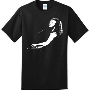 May include: Black t-shirt with a white silhouette of a person playing a keyboard.