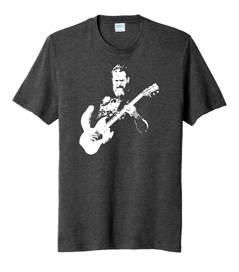 May include: A dark heather grey t-shirt with a white silhouette of a man playing a guitar.