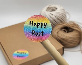 May include: A round sticker with a rainbow glitter background and the text "Happy Post" in black.