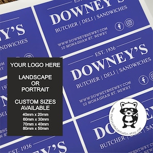 May include: A blue and white sticker with the text "Downey's Butcher | Deli | Sandwiches" and the website address "www.downeysnewry.com". The sticker also includes the address "10 Monaghan St. Newry" and the text "Est. 1936".
