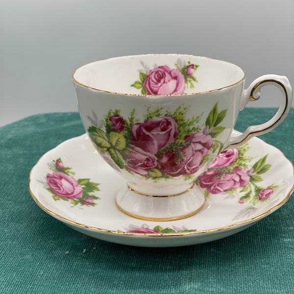 Royal Tuscan Moss Rose bone china, made in England, teacup and saucer, white background with pink rose design