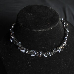 Multi-Strand Black Necklace with Purple beads