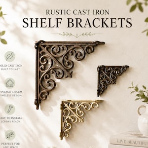 May include: Three L-shaped shelf brackets made of cast iron with ornate scrollwork patterns. One large dark brown bracket, one medium dark brown bracket, and one smaller gold-toned bracket are displayed. Text reads RUSTIC CAST IRON SHELF BRACKETS.