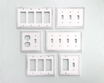 Placa de interruptor de luz de metal moderna: placa de pared minimalista para decoración contemporánea del hogar.