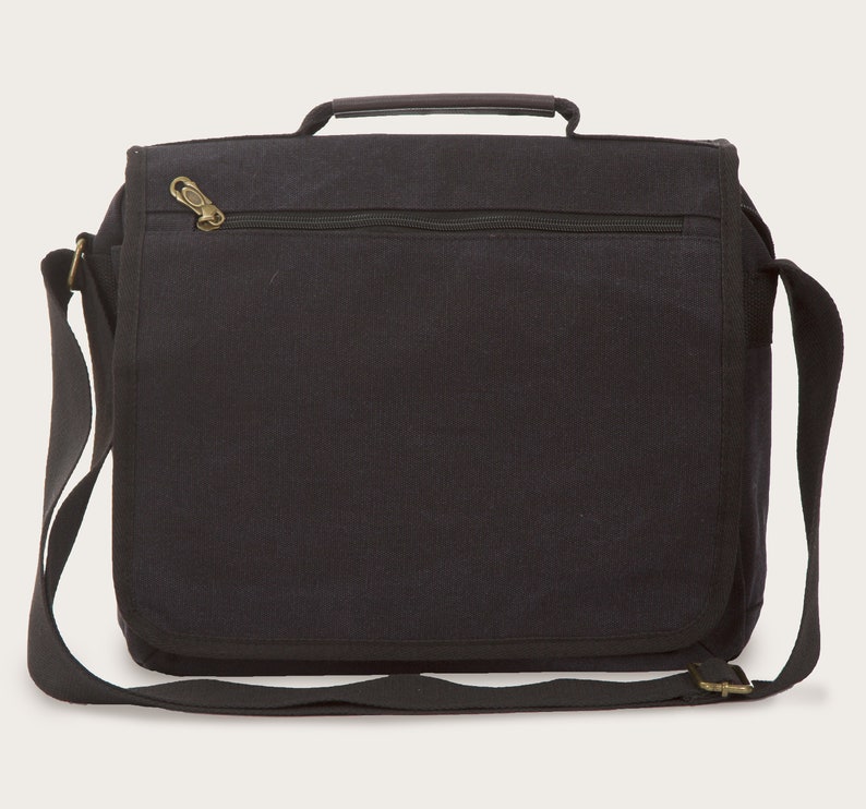 May include: A black canvas messenger bag with a zippered pocket and a top handle. The bag has a long adjustable shoulder strap.