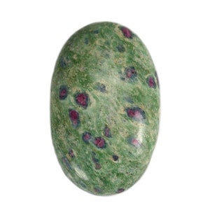 May include: An oval-shaped gemstone with a speckled pattern in shades of green and pink.