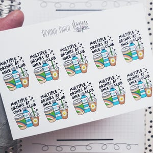 May include: A sheet of stickers featuring colorful drink illustrations with the text "MULTIPLE DRINKS AT ONCE CLUB." The stickers include images of water bottles, coffee cups, and rainbow-colored drinks. The stickers are on a white background.