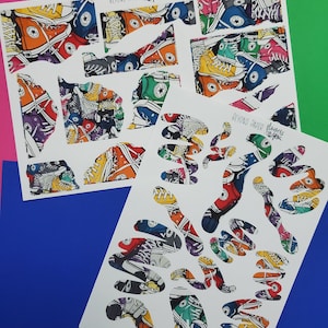 May include: A sheet of white paper with a colorful pattern of Converse sneakers. The paper is cut into various shapes, including a large heart, a star, and several smaller shapes. The text "Beyond Paper" and "Flowers Converse" is printed on the paper.