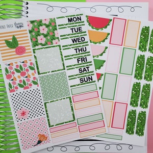 May include: A set of planner stickers featuring a variety of designs, including floral patterns, polka dots, geometric shapes, and a watermelon slice. The stickers also include a days of the week planner section with the text "MON, TUE, WED, THU, FRI, SAT, SUN".