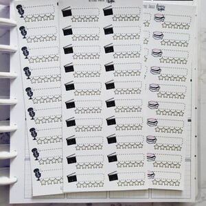 May include: White sticker sheets with black illustrations of microphones, film clapperboards, and stacks of books. Each sticker has a dotted line for writing and a row of five stars for rating. The text "Beyond Paper" is visible.