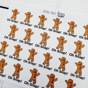 May include: A sheet of stickers featuring gingerbread men with the text "Oh Snap!" printed on each sticker.