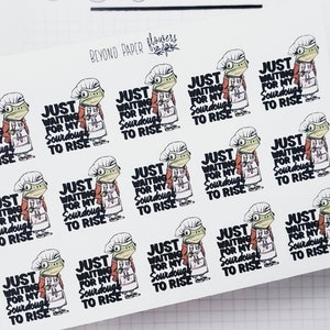 May include: A sheet of stickers featuring a cartoon frog wearing a chef's hat and apron. The stickers say "Just waiting for my sourdough to rise".