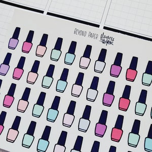 May include: A sheet of stickers featuring nail polish bottles in various colors, including pink, blue, purple, and white. The stickers are arranged in rows and columns on a white background. The text "Beyond Paper" and "flowers" is visible in the top right corner of the sheet.