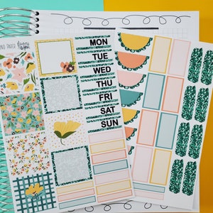May include: A set of planner stickers with floral and geometric designs. The stickers include a variety of shapes and sizes, including squares, rectangles, and circles. The stickers are printed on white paper with a glossy finish. The stickers are perfect for adding a touch of personality to your planner.