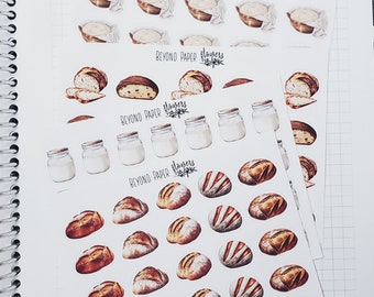 May include: A sheet of stickers featuring illustrations of bread, jars of milk, and dough rising in bowls. The stickers are white with a light brown background and feature the text "Beyond Paper Flowers".