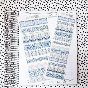 May include: A sheet of blue and white patterned washi tape with the text "Beyond Paper" and "Flowers" printed on it. The tape features a variety of floral and geometric designs.