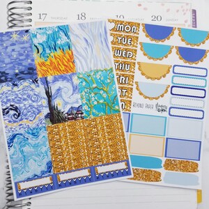 May include: A set of planner stickers featuring a starry night theme with a gold glitter background. The stickers include a variety of designs, including a painting of a starry night, a painting of a sunflower field, and a painting of a cherry blossom tree. The stickers also include a set of day-of-the-week stickers, a set of blank boxes, and a set of decorative elements.
