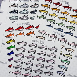 May include: A set of colorful running shoe stickers with a heart design. The stickers are arranged in rows on a white background. The text "BEYOND PAPER flowers" appears on the stickers.