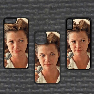 May include: Three phone cases featuring a woman with dark hair and a white shirt holding a vintage phone receiver. The cases are black with a white border.