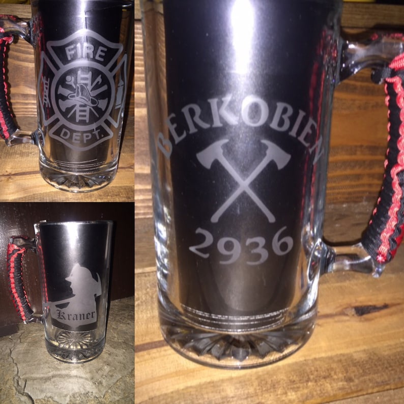May include: A black and red personalized beer stein with a firefighter emblem, the text "Fire Dept." and a crossed axe graphic with the text "Berkobien 2936".