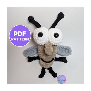 May include: Crochet pattern for a cute, brown and black fly with big white eyes. The pattern is available as a PDF download.