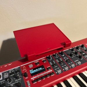Optional platform in red, for small controller or foot pedal