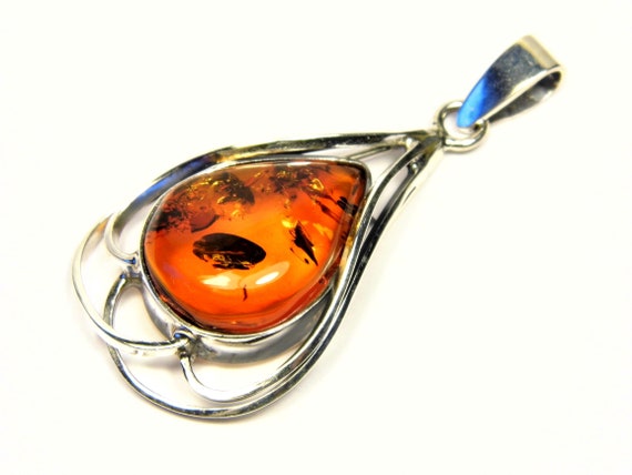 Natural Baltic Amber and Sterling Silver 925 women's pendant brown 3859