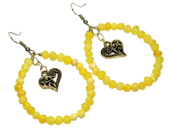 Boucles d'oreilles pendantes / pendantes / créoles pour femmes en ambre de la Baltique jaune avec coeurs AP1013
