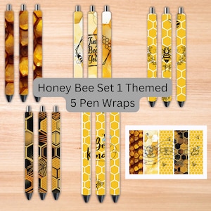 May include: Set of five yellow and black pen wraps with a honey bee theme. The wraps feature honeycomb patterns, bees, and text that says "Just Bee You", "Be Kind", and "Be You".