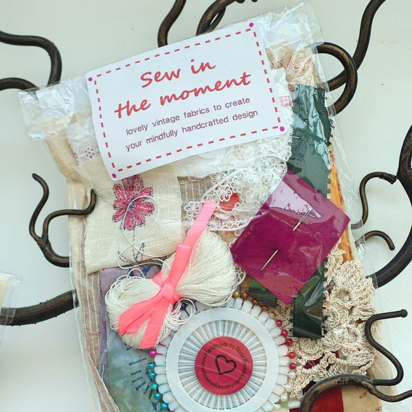 slow sewing kit for mindfulness from upcycled and vintage fabric, ribbons and findings. Whole craft kit in a bag with instructional leaflet