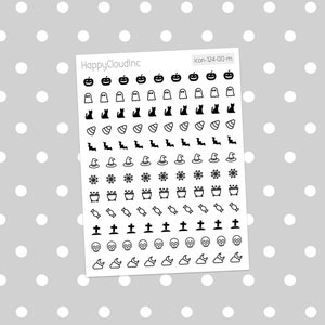 May include: A sheet of Halloween themed stickers with various icons including pumpkins, ghosts, bats, witches' hats, candy corn, cauldrons, skulls, and moons. The stickers are black and white.