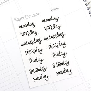 May include: A sheet of white paper with black cursive lettering for each day of the week. The days of the week are: Monday, Tuesday, Wednesday, Thursday, Friday, Saturday, and Sunday.
