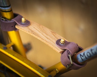 Bike carrying handle. Full-grain vegtanned leather and wood handle.