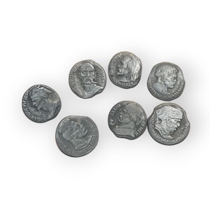 May include: Seven antique silver-colored coins with detailed relief portraits and Cyrillic text. The coins are arranged on a white background, showcasing their historical design and craftsmanship.