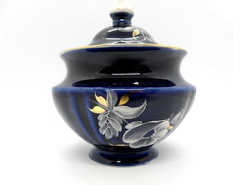 Azucarero vintage de porcelana azul cobalto con diseño floral pintado a mano.