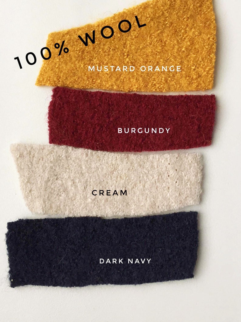 May include: Four fabric swatches of 100% wool in different colors: mustard orange, burgundy, cream, and dark navy.