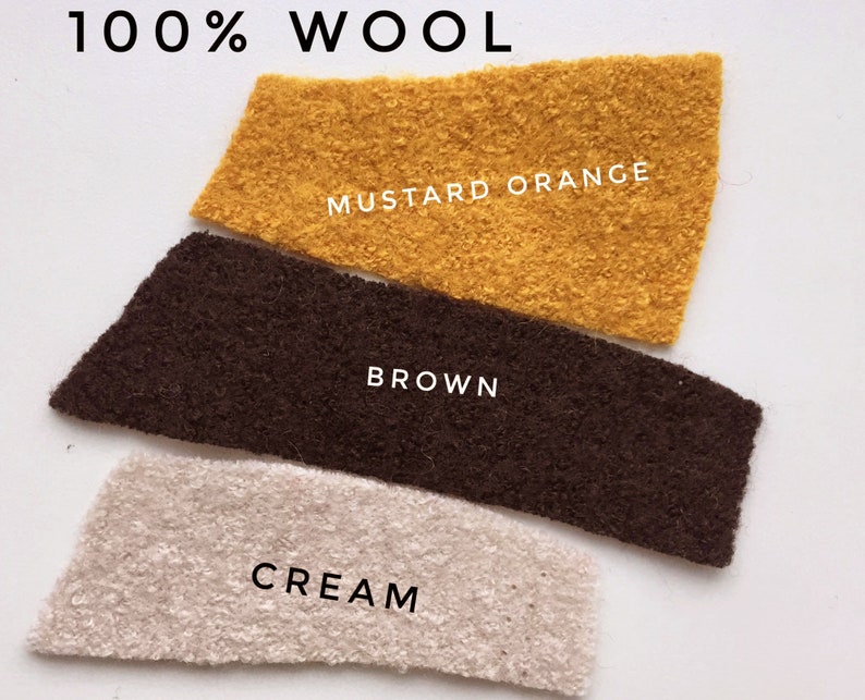 May include: Three fabric swatches of 100% wool in cream, brown, and mustard orange.