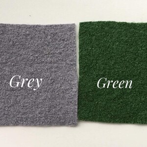 May include: Two fabric swatches, one grey and one green. The swatches are labeled "Grey" and "Green".