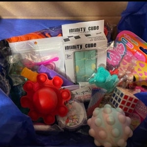 Mystery fidget box, fidget, fidget box, sensory toys, sensory, fidget toys, slime, mystery box, fidgets,go fidget, go fidget box, pop it,