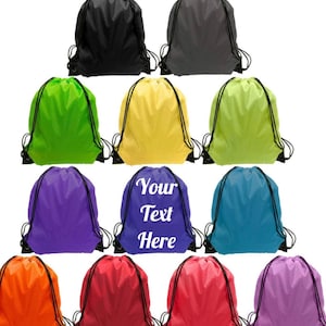 May include: A set of 10 drawstring bags in various colors, including black, gray, green, yellow, light green, purple, blue, orange, red, and pink. The bags have black drawstrings and are made of a lightweight fabric. One bag has the text "Your Text Here" printed on it.