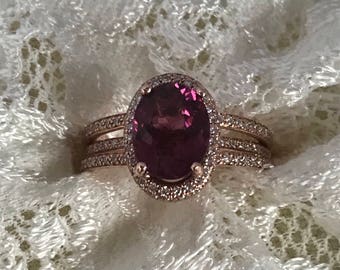Oval rosa turmalinring, diamanthalo, 14k roséguld