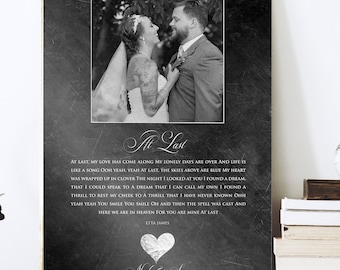 May include: Black and white photo of a couple on a chalkboard background with a poem about love and a heart design. The poem reads "At last my love has come along, my lonely days are over, and life is like a song. Don't you tear the weight, the skies above are but my heart was wrapped up in clover, for you I looked at you I found a dream that I could speak to a dream that I can call my own. I found a thrill to rest my cheek to a thrill that I have never known.  Yeah, yeah you smile in heaven for you are the one. The spell was cast and here we are mine at last." The names "Nick & Sue" and the date "4.12.2018" are written below the heart.